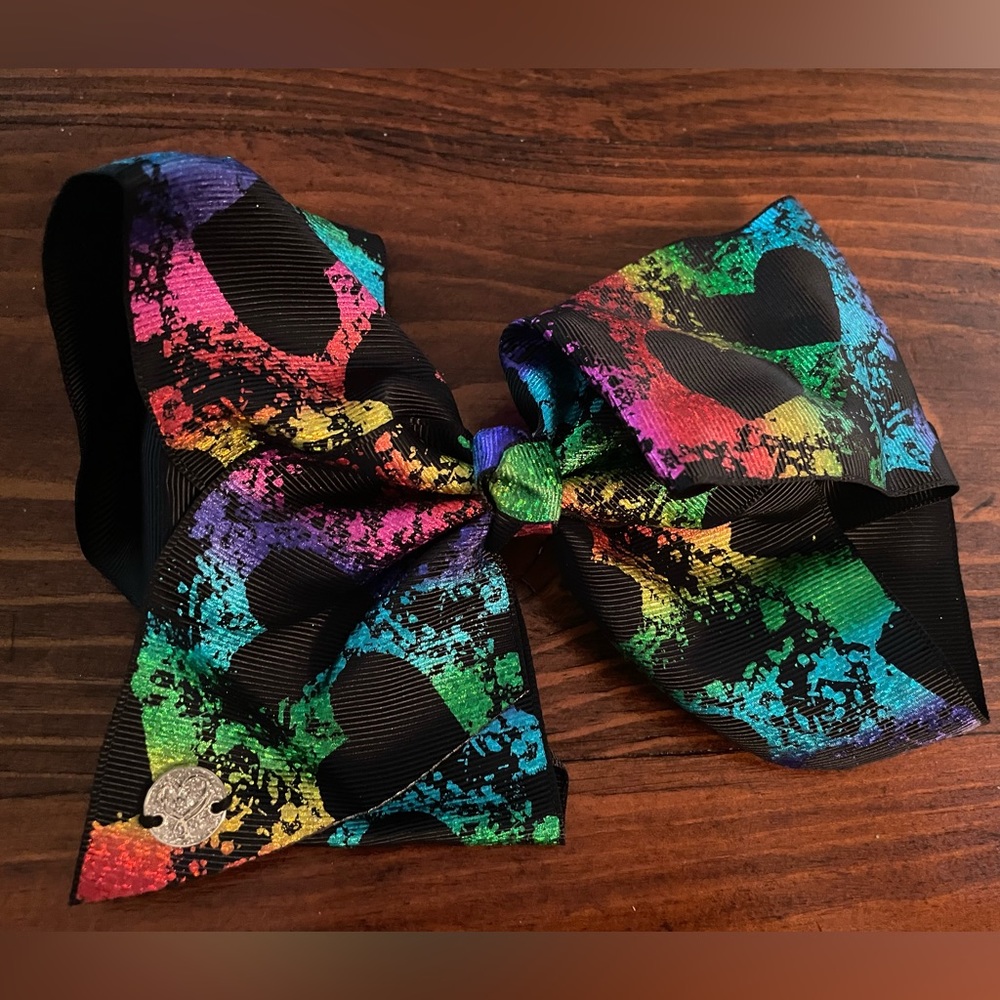 Jojo Siwa signature collection Black Heart Multi Color Bow hair clip.